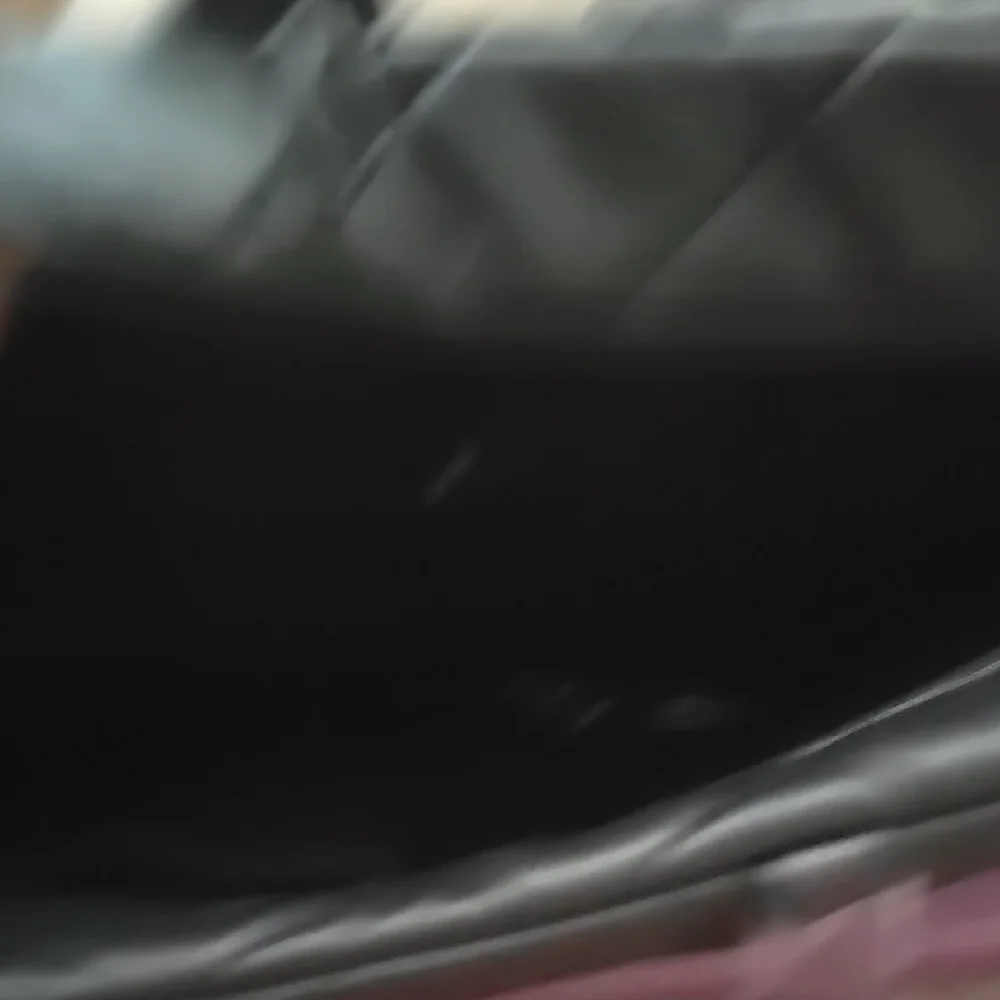 Black Quilted Travel Bag with Diamond Stitching - Picture 3 of 6